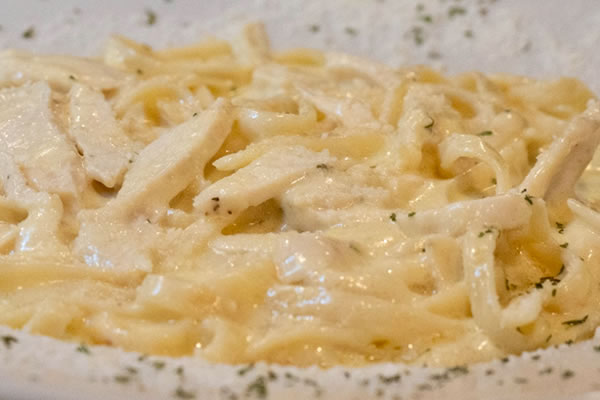 Fettuccini Chicken Alfredo Entree at Broadway Ristorante and Pizzeria